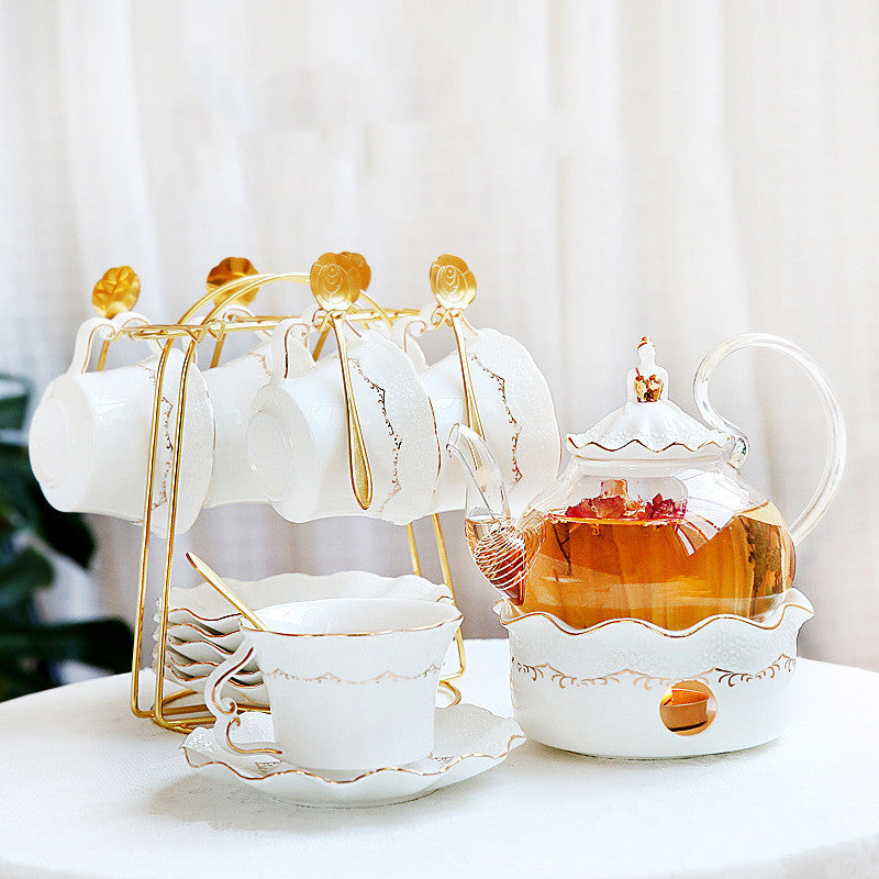 Gilded Elegance: Indulge in Luxurious Tea Time with our Golden Ceramic and Glass Teapot Set